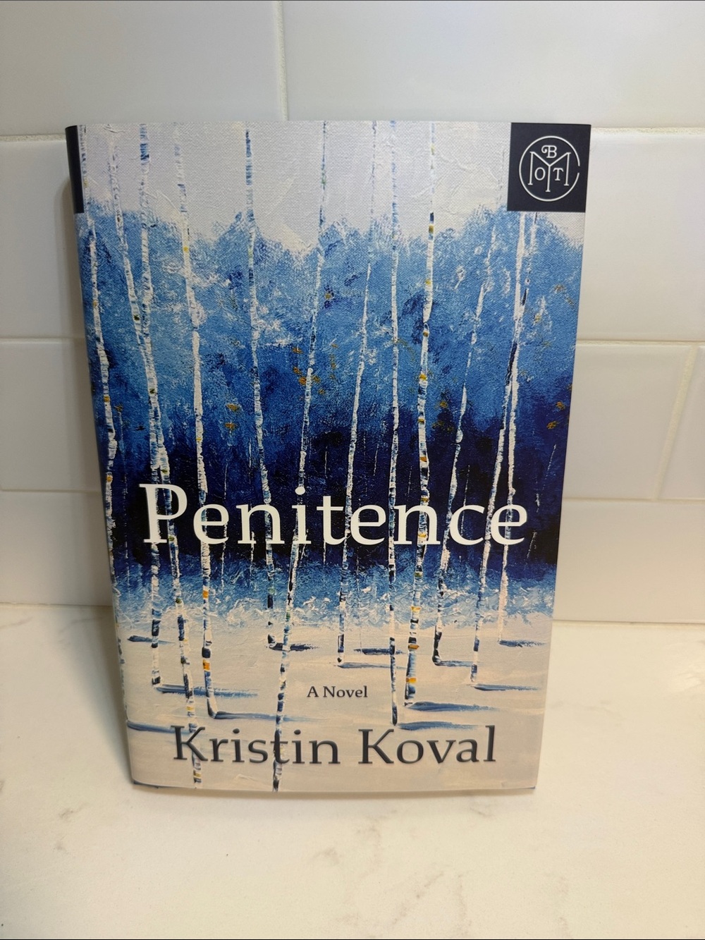 Penitence by Kristin Koval - Blue & White Cover Novel